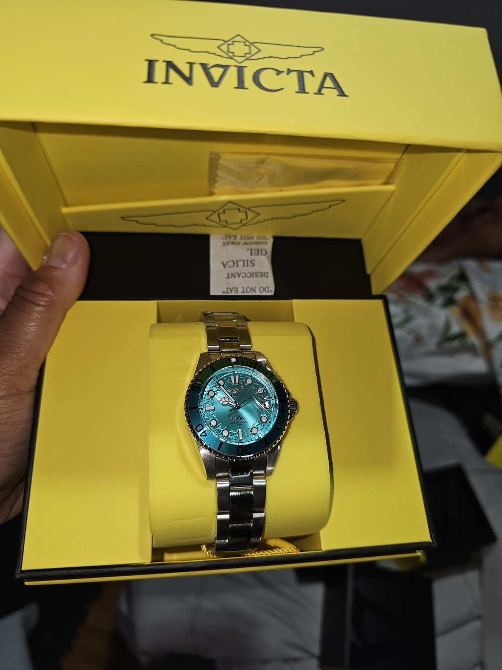 Invicta Women's Silver Watch with Turquoise Dial